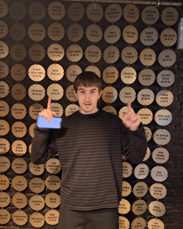 CRYME backstage at Fuse Brussels in front of their wall of past DJ discs